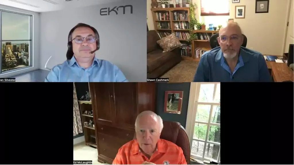 A screenshot of a video call with three older men in separate rooms, each visible in their own video window. Among them are Shawn Cashmark and Ed McLaughlin from EKM Global. The backgrounds show home offices or living rooms with bookshelves, windows, and decor.